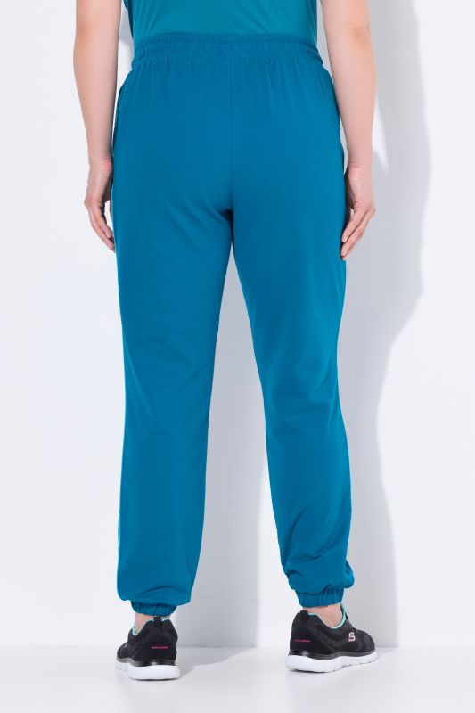 Pantalon de jogging, taille et bas de jambe élastiques, passepoil sur les côtés