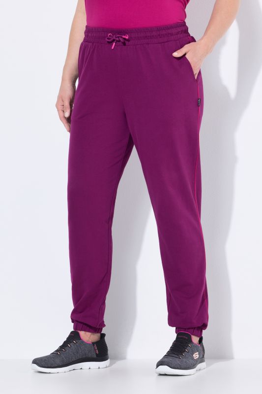 Pantalon de jogging, taille et bas de jambe élastiques, passepoil sur les côtés