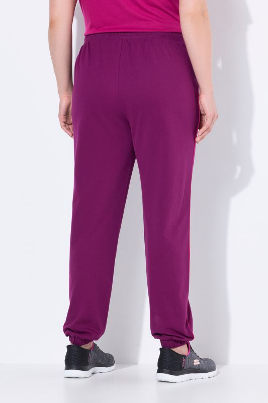 Pantalon de jogging, taille et bas de jambe élastiques, passepoil sur les côtés