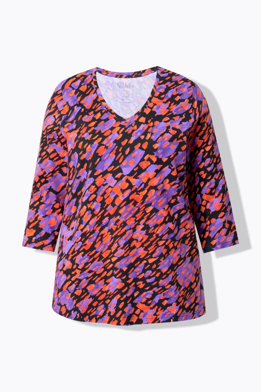 T-shirt, coupe évasée. Col en V et manches 3/4