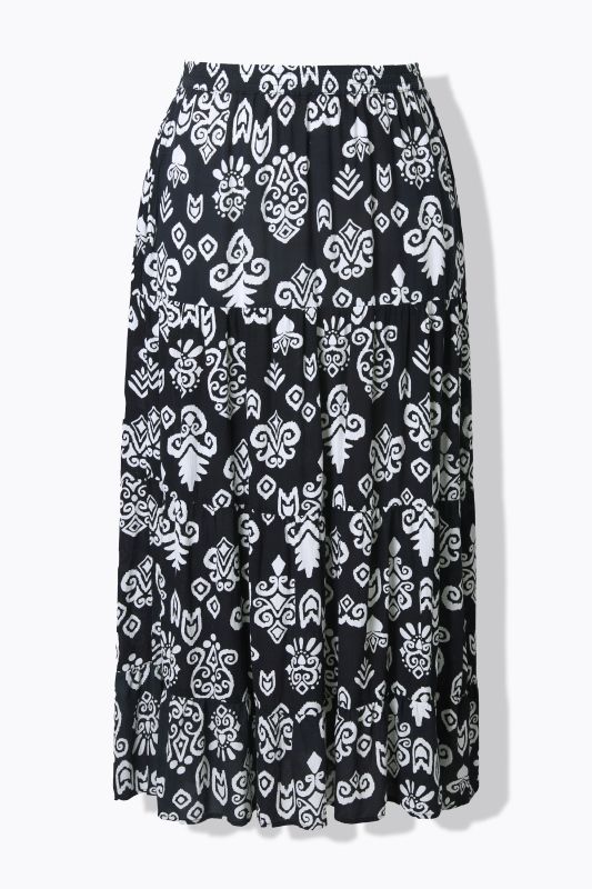 Jupe avec volants et poches. Taille élastique. Coupe évasée