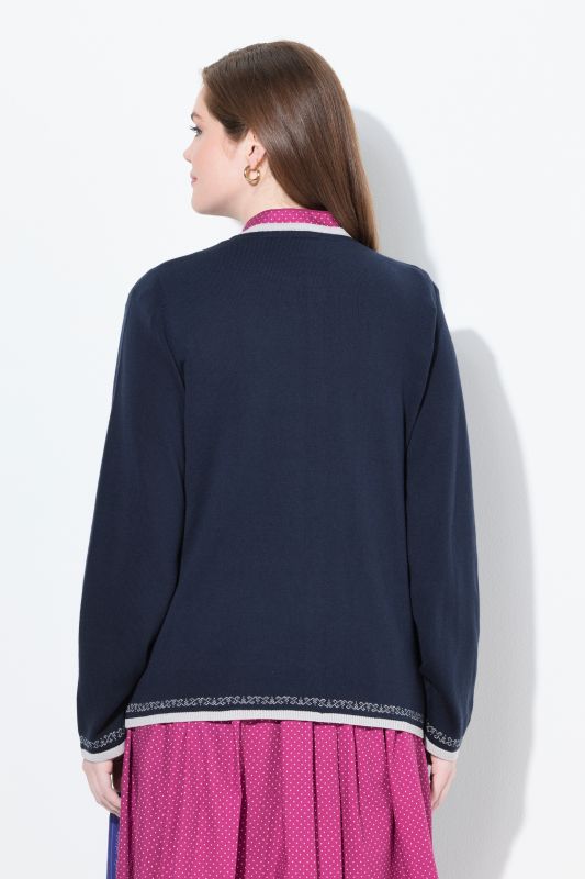 Cardigan encolure ronde et manches longues. Boutons traditionnels bavarois