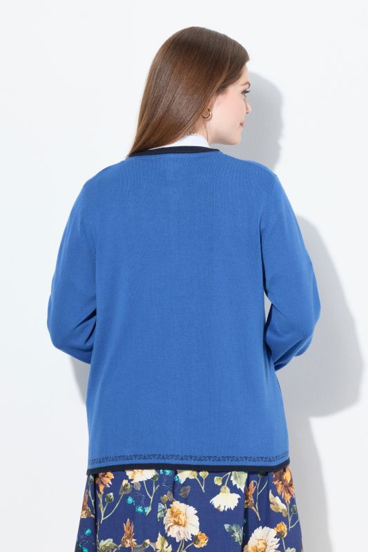 Cardigan encolure ronde et manches longues. Boutons traditionnels bavarois