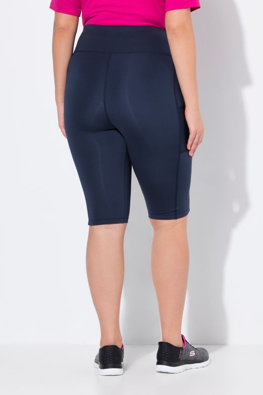 Legging court en matière recyclée, taille élastique et poche en mesh