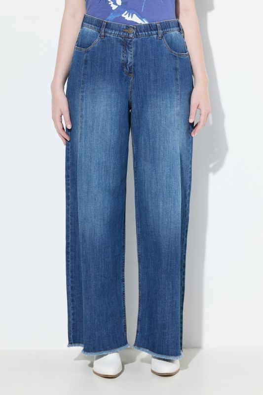 Jean Mary en denim stretch, jambe ultra-large et bas de jambe frangé