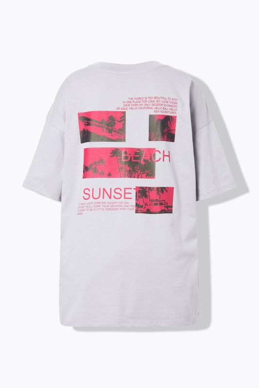 T-shirt oversize, motif palmiers. Manches courtes