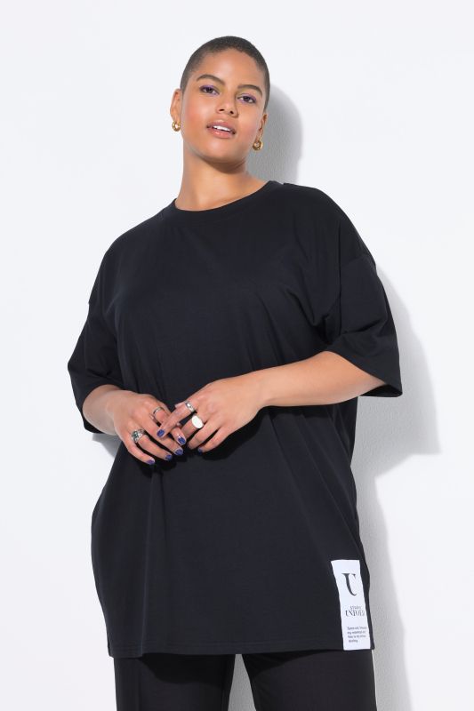 T-shirt oversize. Manches courtes. Patch sur la base