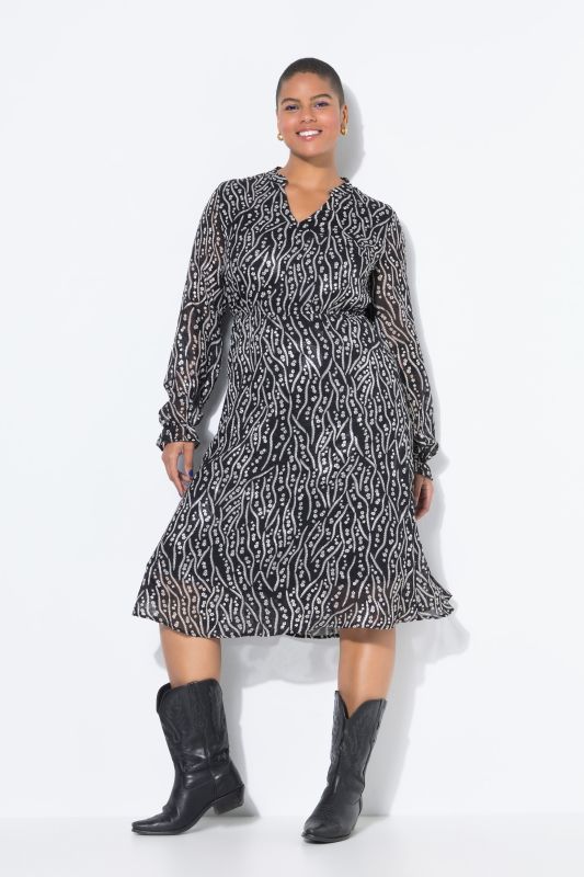 Robe midi, coupe évasée. Manches longues. Imprimé all-over