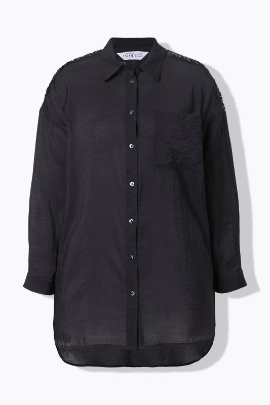 Chemisier oversize. Franges et sequins aux épaules