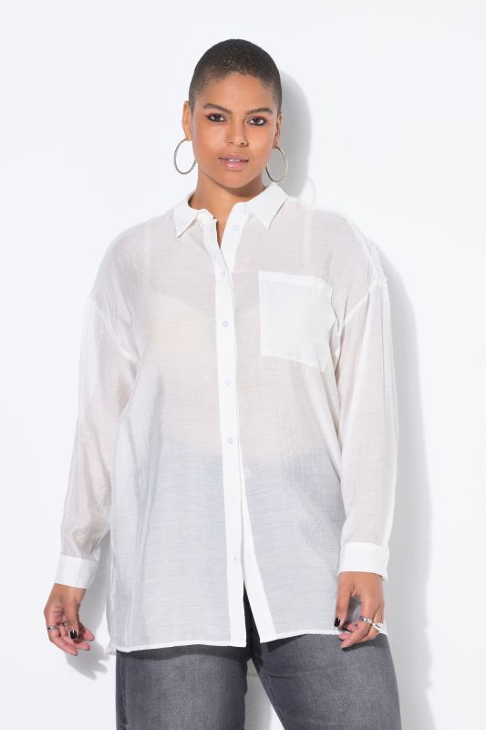 Chemisier oversize. Franges et sequins aux épaules