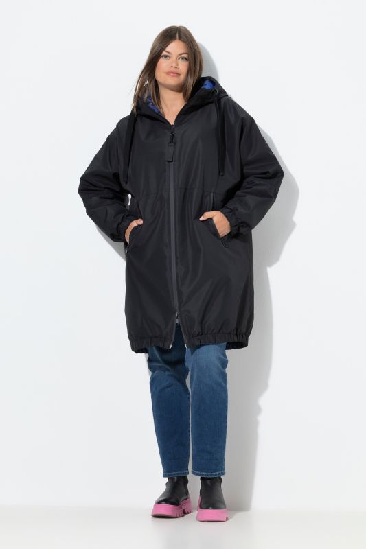 Veste technique oversize à capuche, modèle réversible, avec fermeture à glissière à double sens