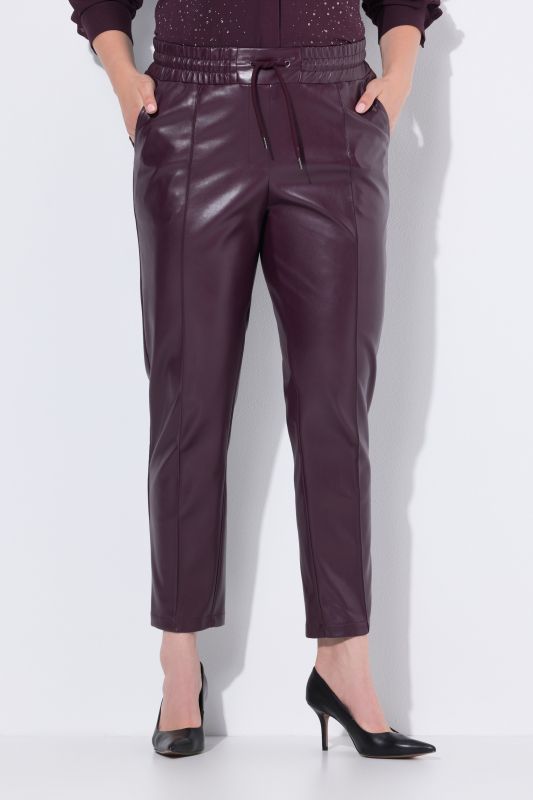 Pantalon 7/8 en similicuir. Passepoils et taille élastique