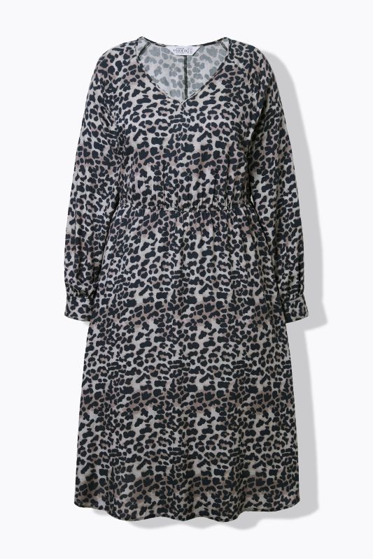 Robe midi, coupe évasée. Taille élastique. Motif léopard