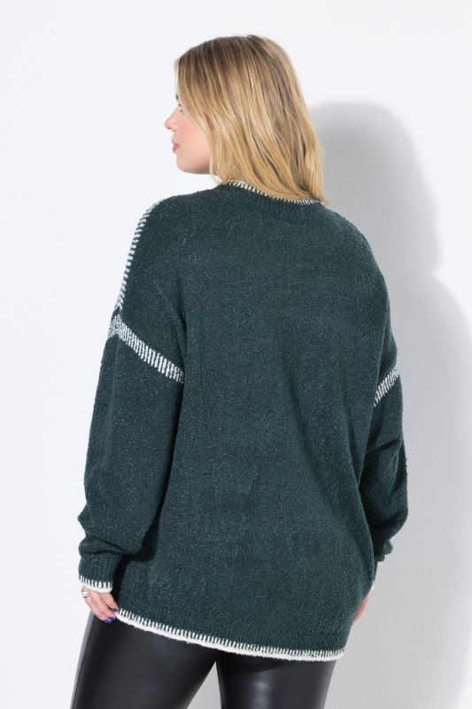 Pull oversize, coutures fantaisie