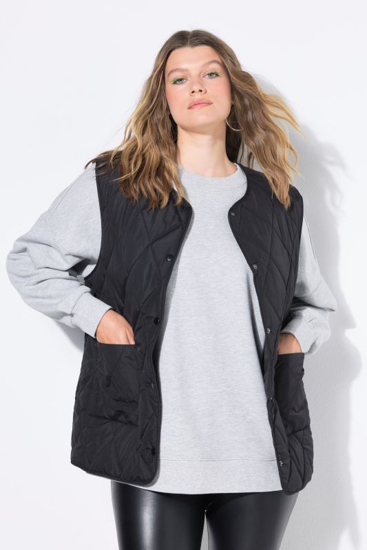 Gilet matelassé léger coupe oversize, avec boutons-pression