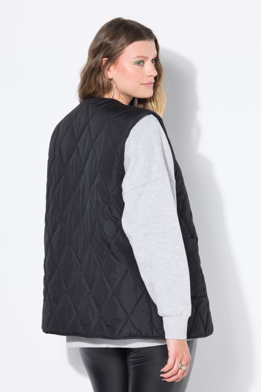 Gilet matelassé léger coupe oversize, avec boutons-pression