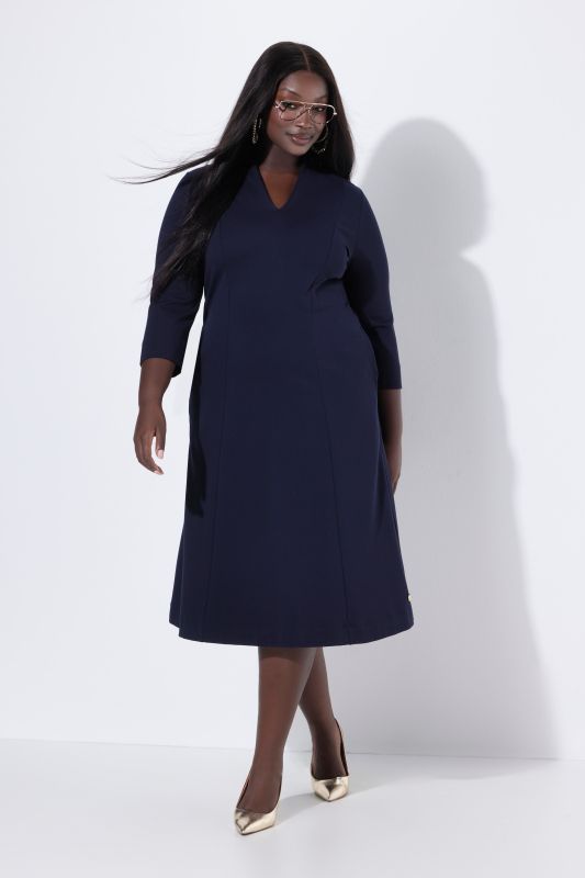 Robe midi point de Rome, manches 3/4, col calice et décolleté en V
