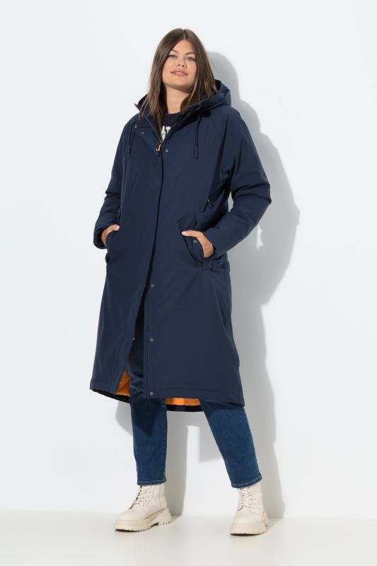 Manteau technique à capuche. Fermeture éclair à double sens. Doubles poches