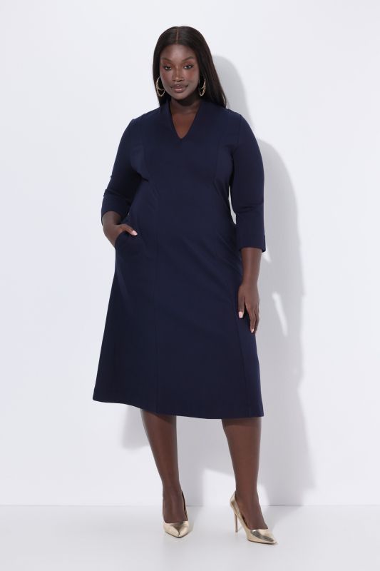 Robe midi point de Rome, manches 3/4, col calice et décolleté en V