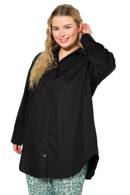 Bouse oversized à manches longues. Patte de boutonnage au dos