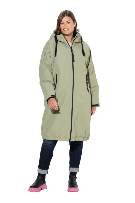 Veste technique oversize à capuche. Doublure polaire bouclée. Fermeture éclair à double sens