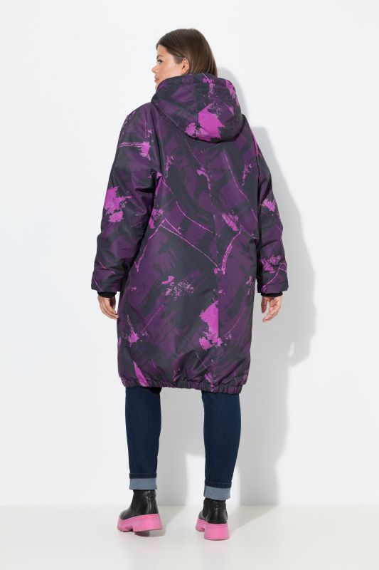 Veste technique oversize imprimée. Doublure polaire bouclée. Capuche