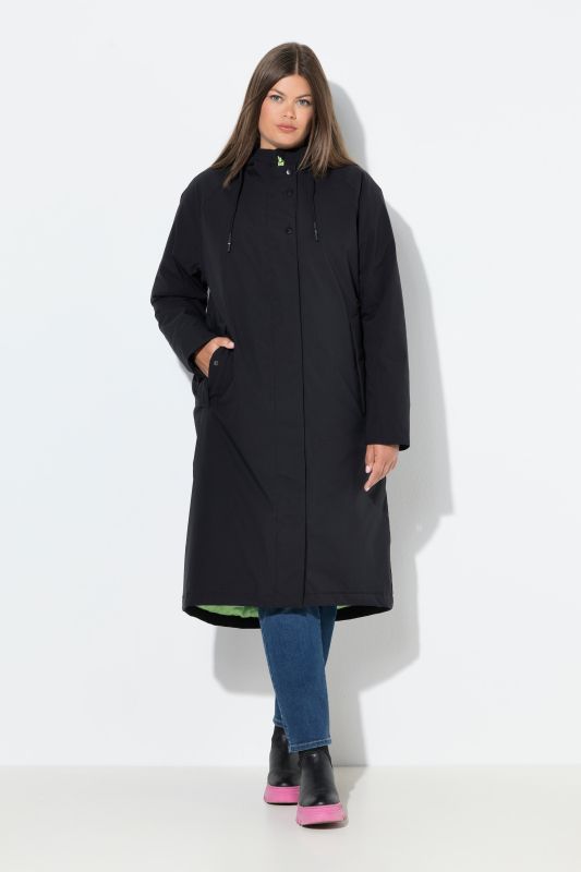 Manteau technique à capuche. Fermeture éclair à double sens. Doubles poches