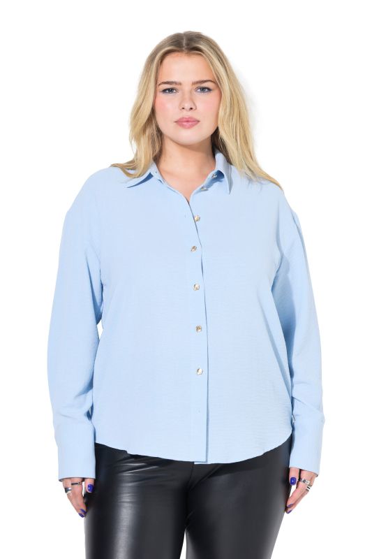 Chemisier oversize. Boutons fantaisie