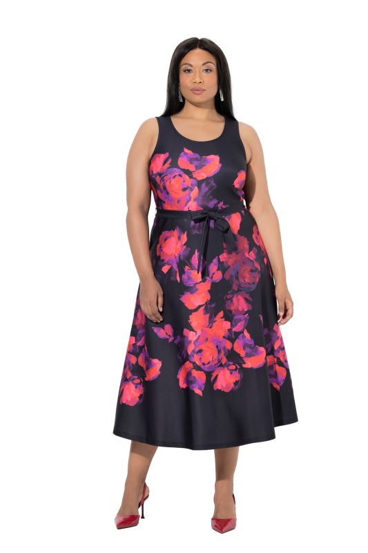 Robe maxi en tissu scuba sans manches à fleurs. Coupe trapèze