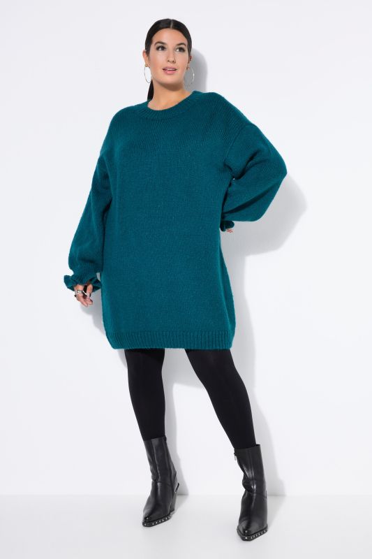Robe en maille oversize. Manches ruchées