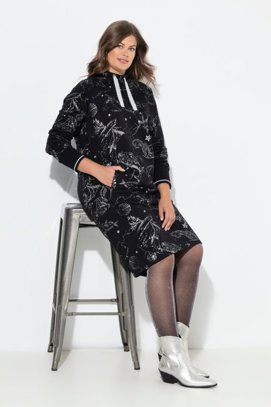 Robe en molleton. Manches longues, poches passepoilées. Label OEKO-TEX