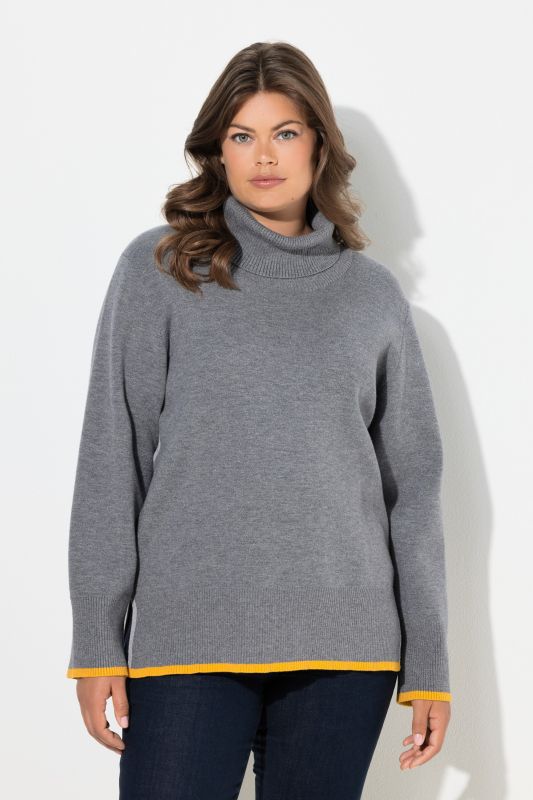 Pull en maille. Col roulé et manches longues