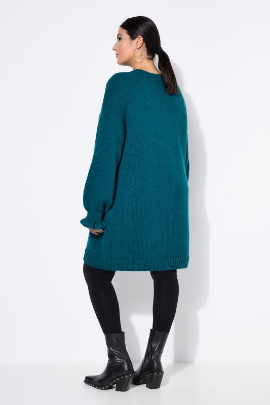 Robe en maille oversize. Manches ruchées