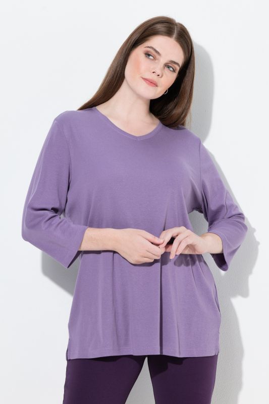 T-shirt, jersey bord-côte. Col en V et manches 3/4. Coton bio