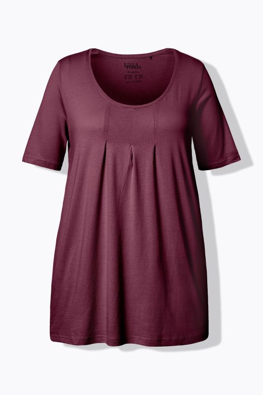 T-shirt en modal. Plis fantaisie, col rond et manches courtes. Coupe évasée