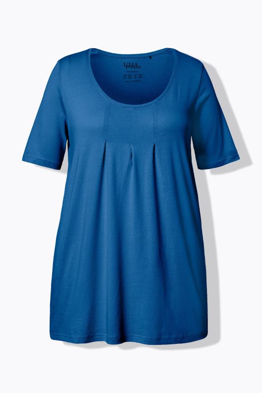 T-shirt en modal. Plis fantaisie, col rond et manches courtes. Coupe évasée