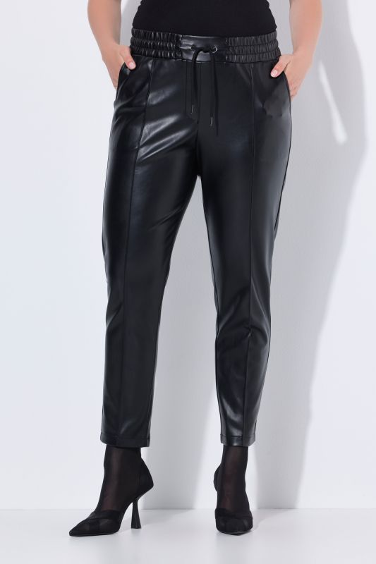 Pantalon 7/8 en similicuir. Passepoils et taille élastique