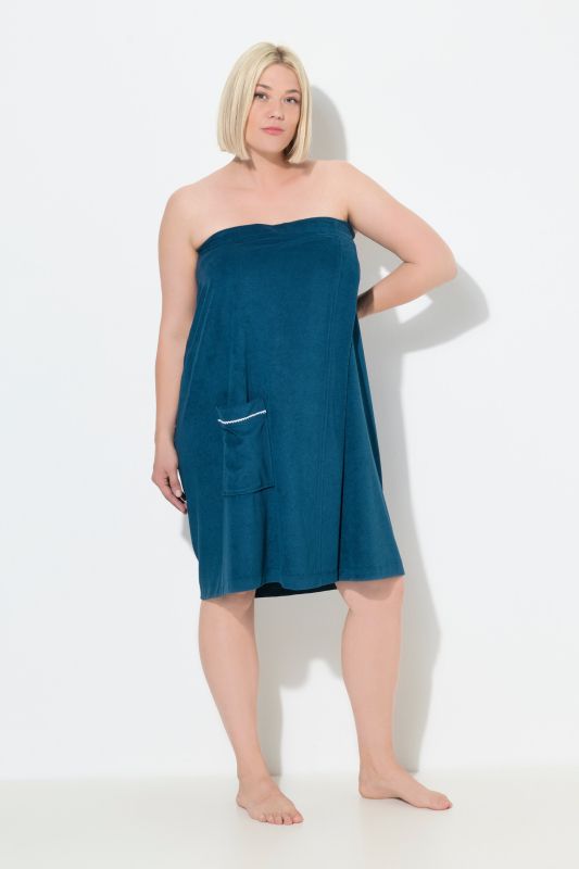 Robe sortie de bain en éponge. Fermeture velcro. Bande élastique dans le dos