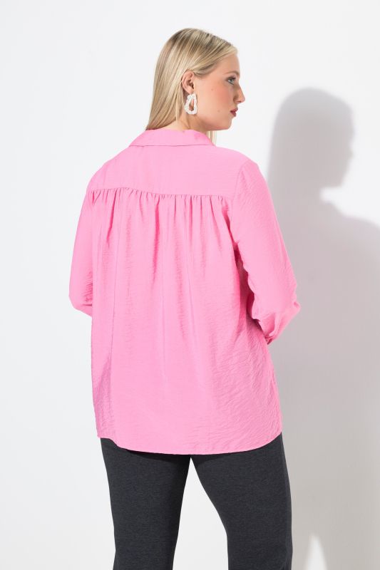 Chemisier en tissu texturé, manches longues et col chemise