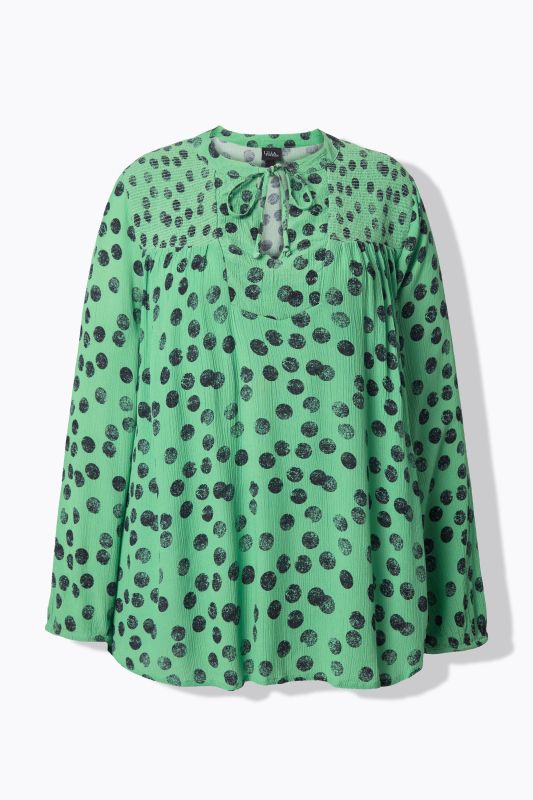 Blouse smockée avec motif à pois, col tunisien et manches longues, coupe évasée