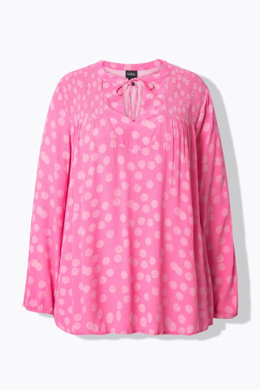 Blouse smockée avec motif à pois, col tunisien et manches longues, coupe évasée
