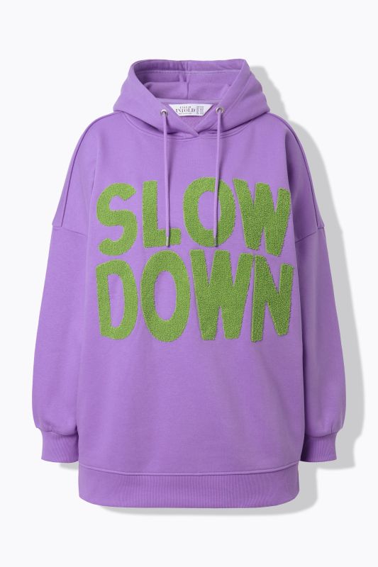 Sweat à capuche oversize. Lettrage en bouclette