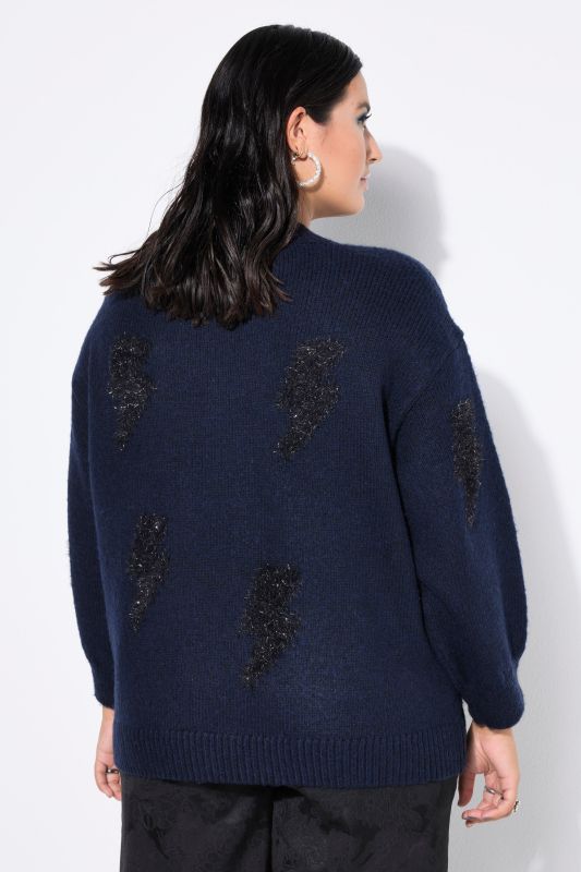 Pull oversize, motifs scintillants