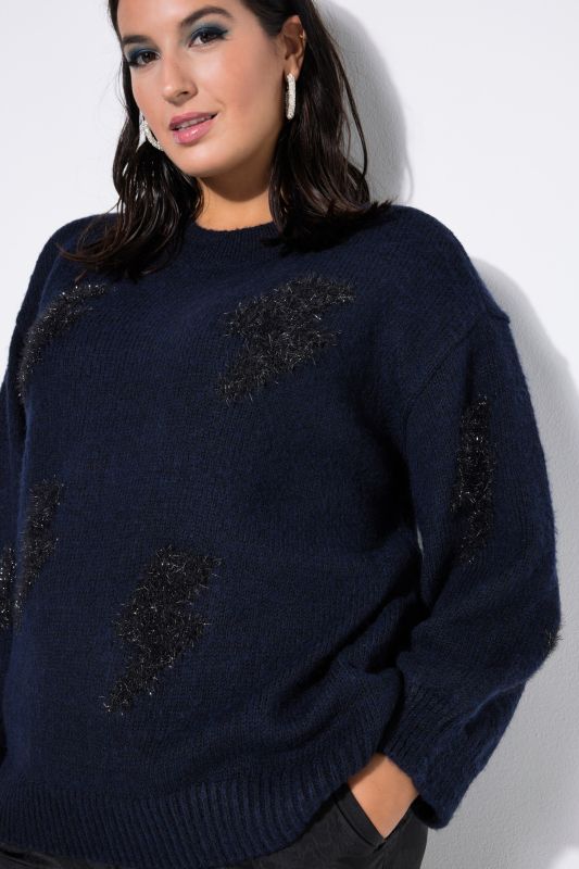 Pull oversize, motifs scintillants