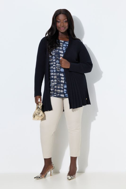 Cardigan plissé. Col châle et manches longues. Coupe évasée