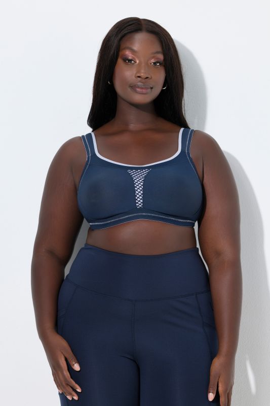 Soutien-gorge de sport, sans armatures. Empiècement en mesh. Bonnet C-E.