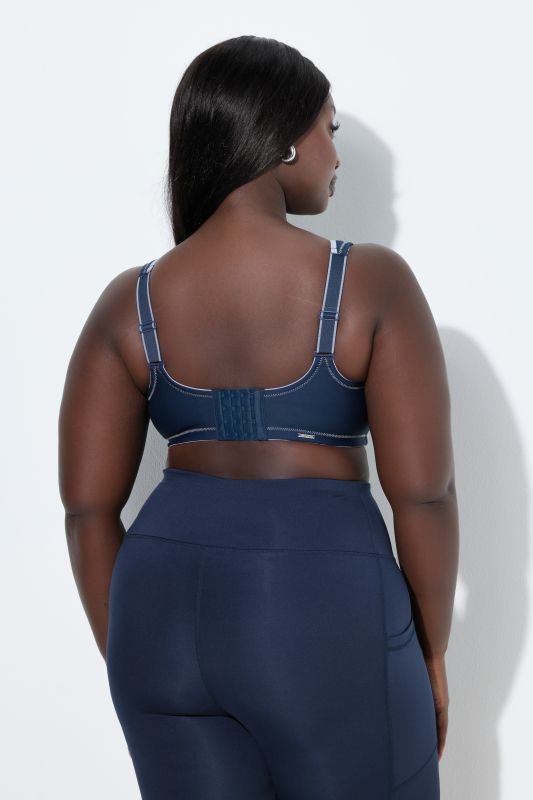 Soutien-gorge de sport, sans armatures. Empiècement en mesh. Bonnet C-E.