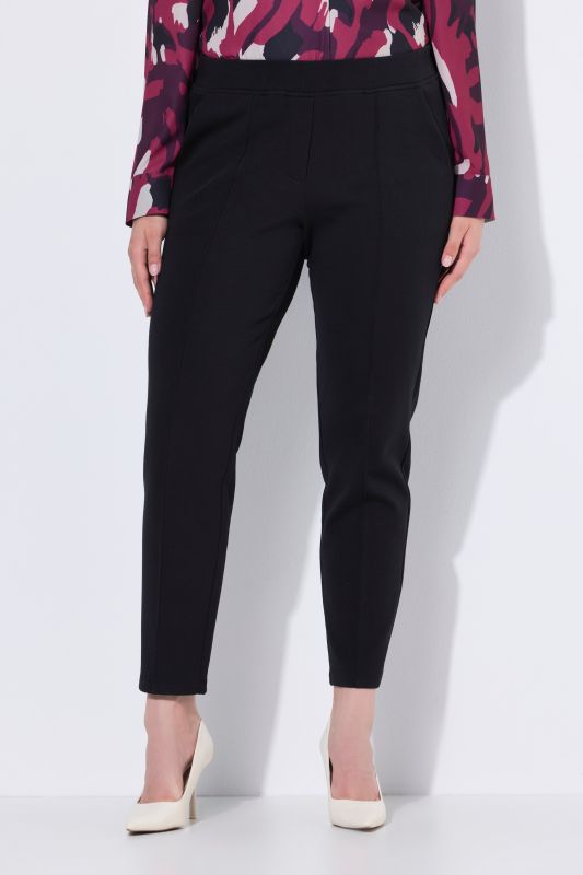 Pantalon point de Rome, jambe carotte. Taille élastique, plis fantaisie