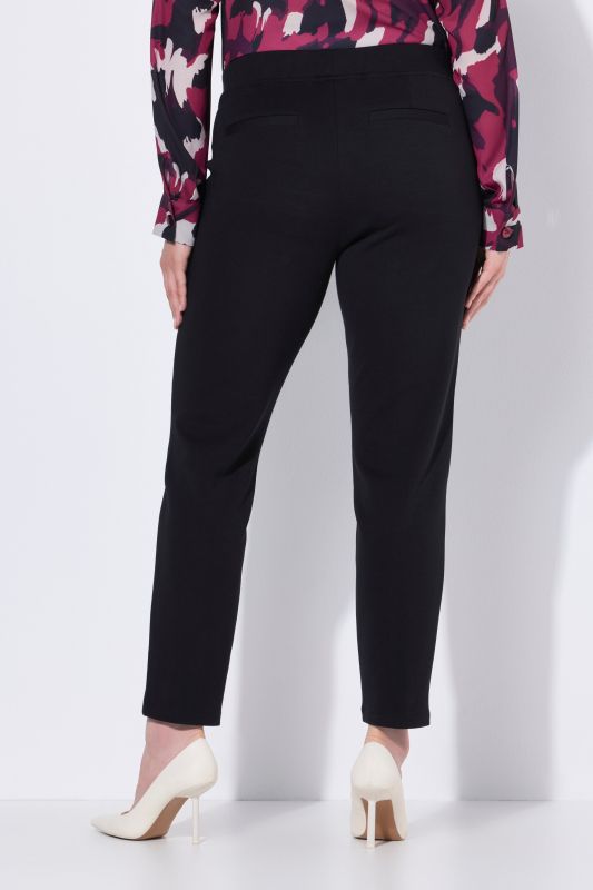 Pantalon point de Rome, jambe carotte. Taille élastique, plis fantaisie