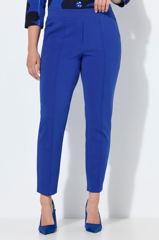Pantalon point de Rome, jambe carotte. Taille élastique, plis fantaisie